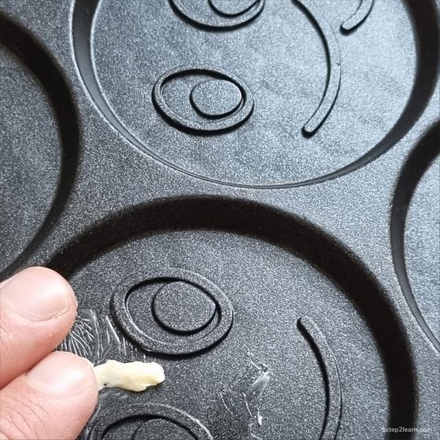 Grease the pan with butter